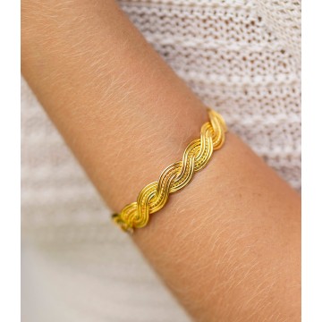 BRAZALETE TRENZADO EN...