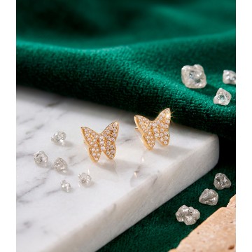 TOPOS MARIPOSAS DORADAS EN...