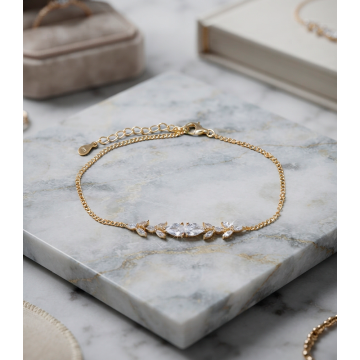 PULSERA CON HOJAS DORADAS...