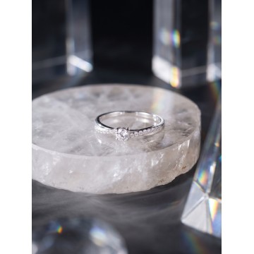 ANILLO SOLITARIO CRUZADO EN...